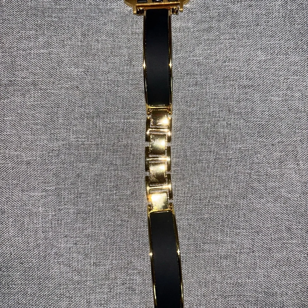 Gold and Black Apple Watch Band
